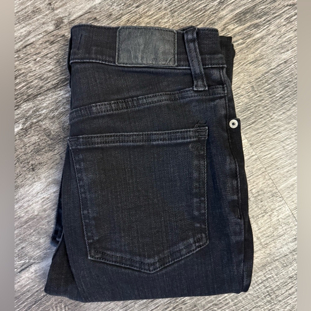 Woman’s Madewell Mid Rise Kick Out Black Jeans